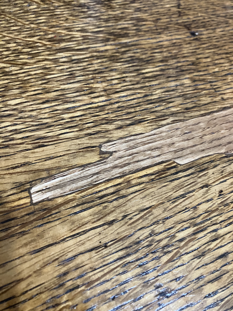 Cabinet top veneer damage